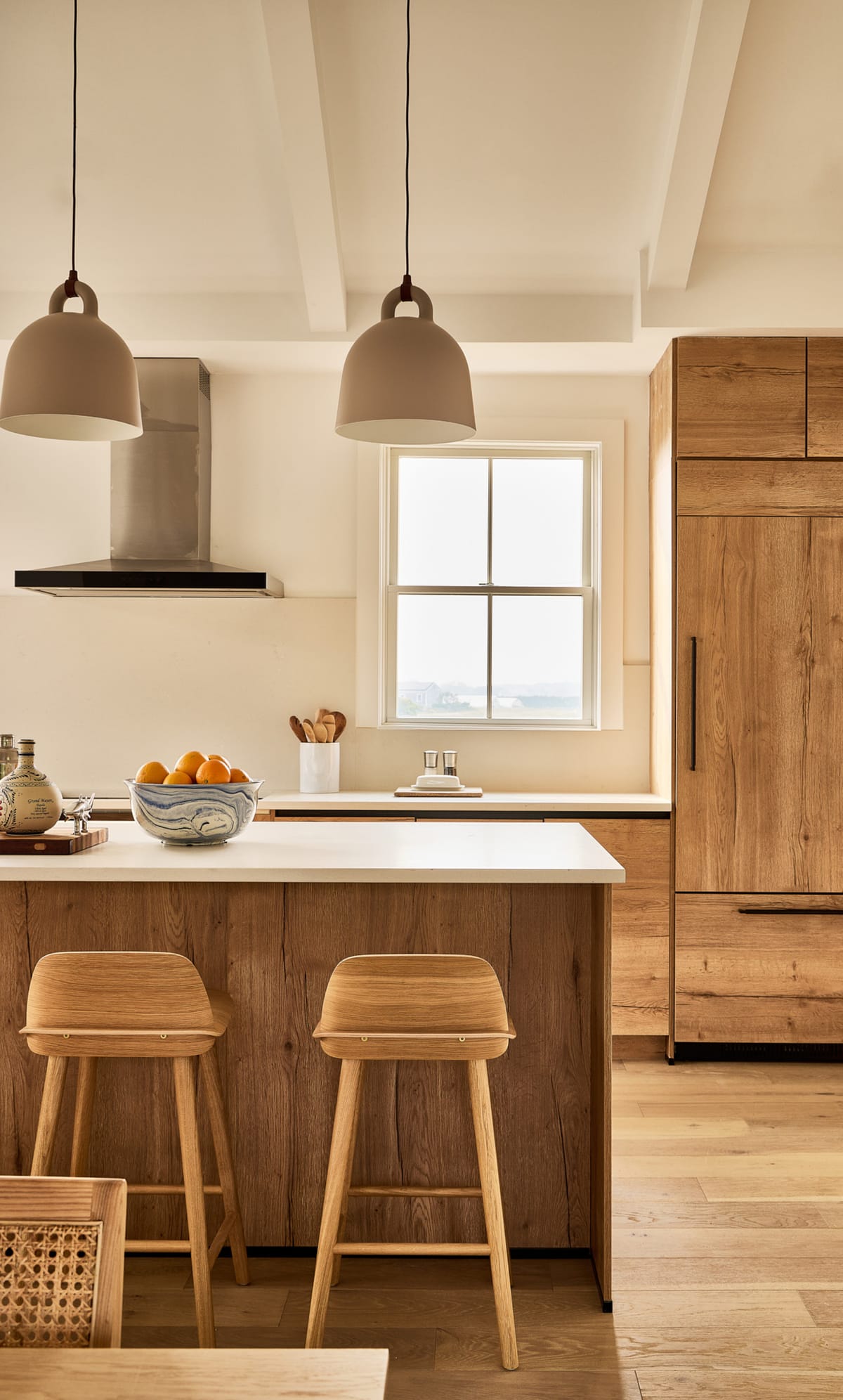 Oak island and tall cabinetry