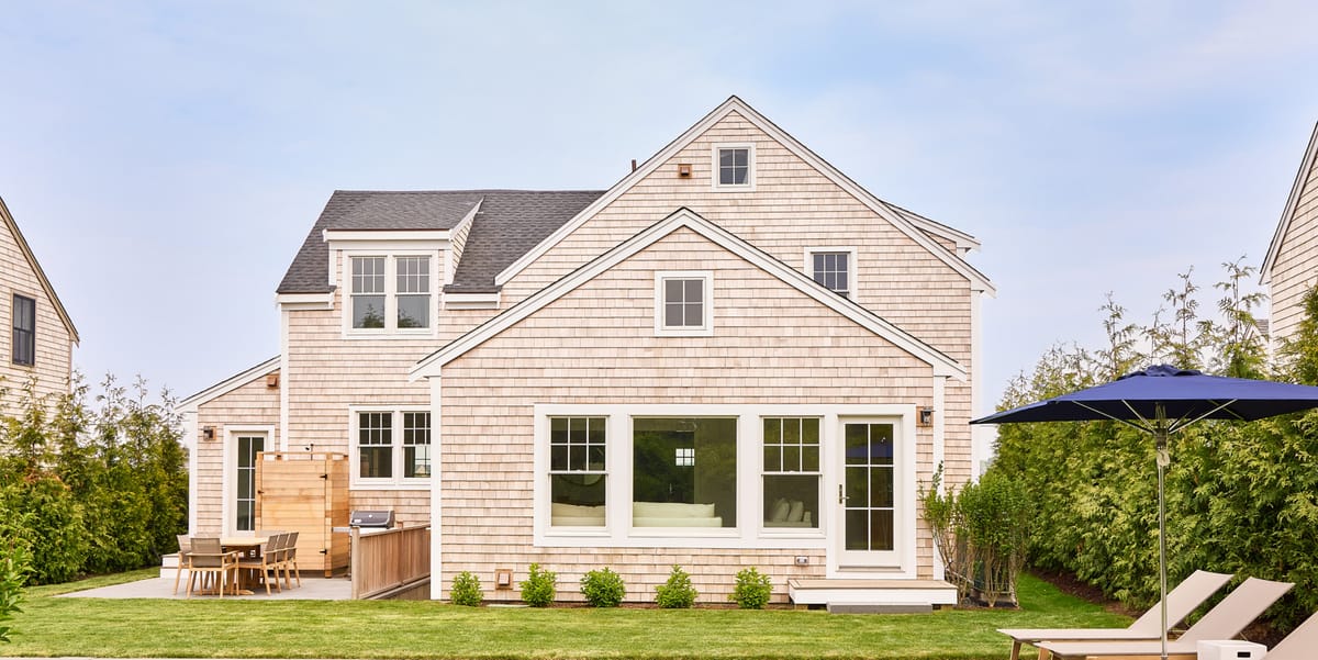 Back of the shingled house and garden