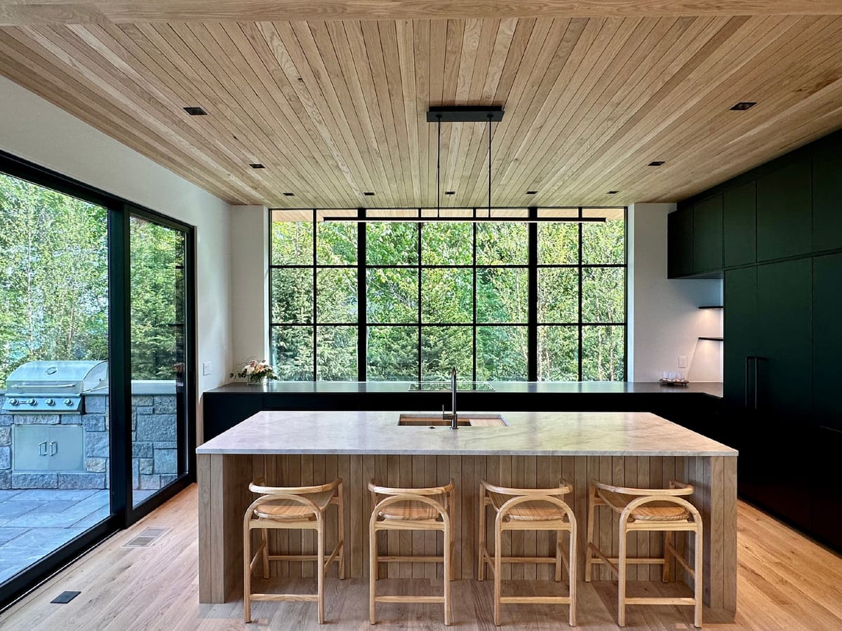 Kitchen island under a wood ceiling