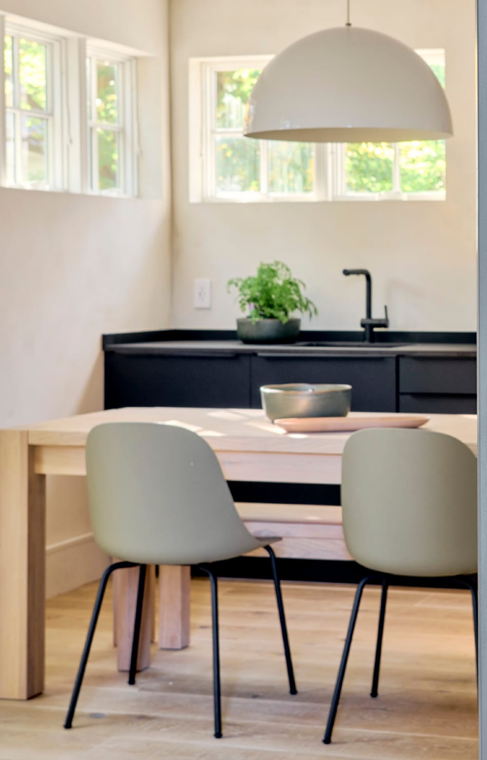 Dining nook with a white pendant